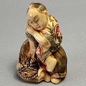 японская нэцкэ из слоновой кости Мальчик на Быке, эпоха Эдо
