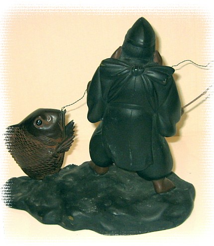 японская антикварная бронзовая статуэтка в виде одного из Семи Богов Счастья Эбису