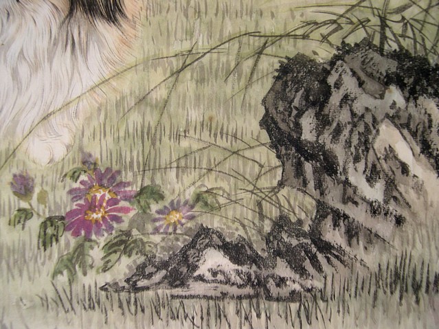 японский хин в траве, деталь